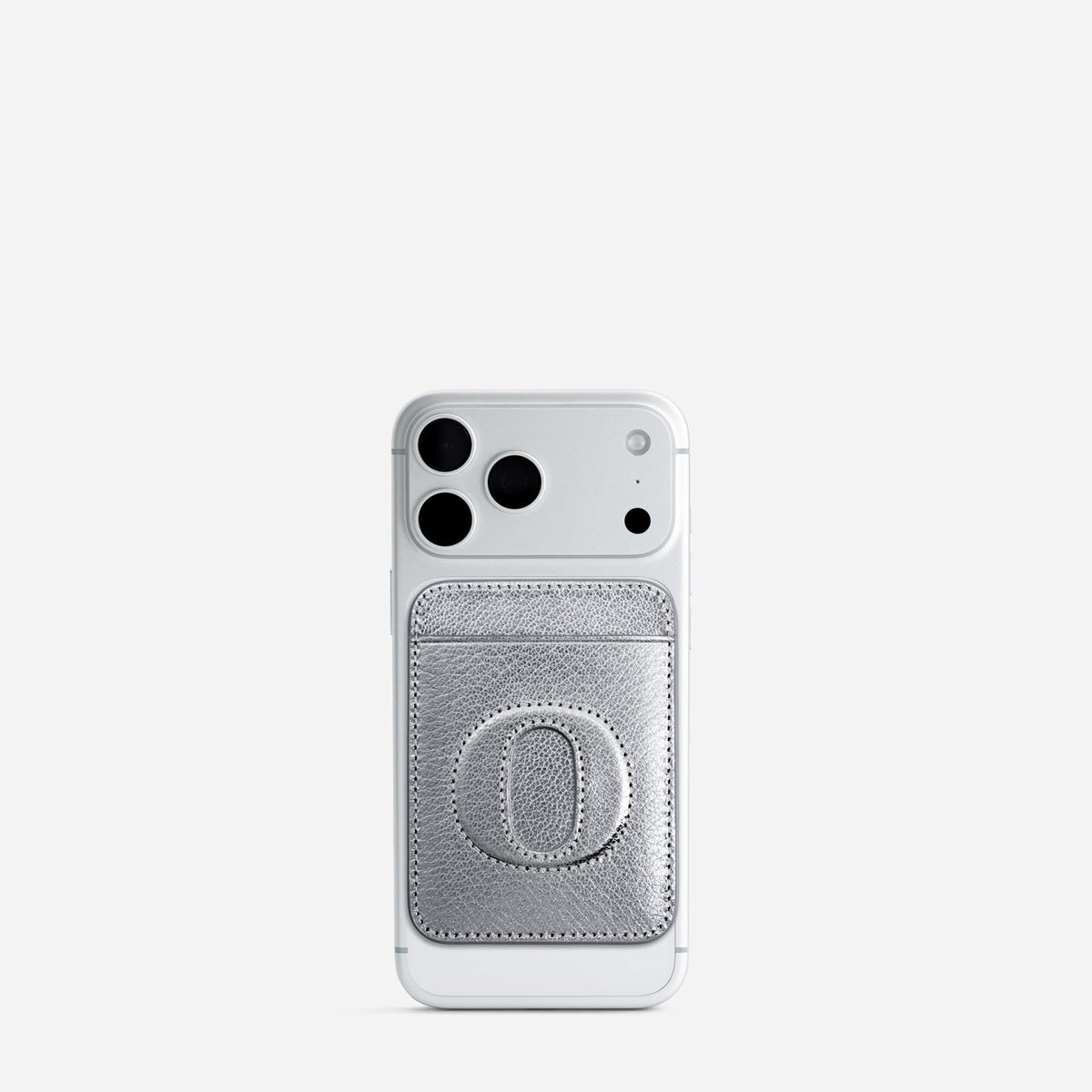 MagSafe cardholder in Metallic Silver, initial O, on phone