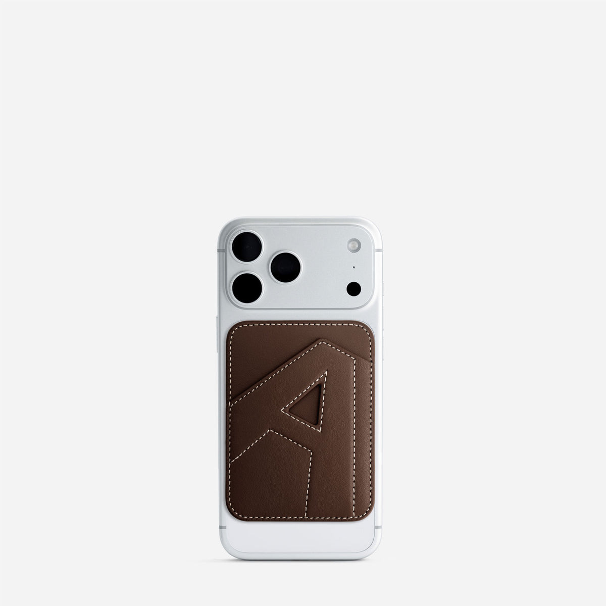 MagSafe cardholder in Espresso, initial A, on phone